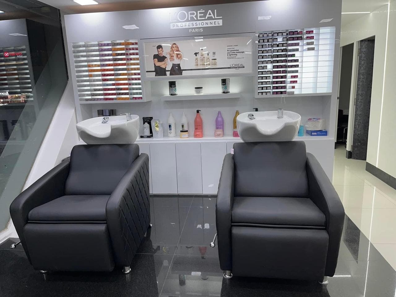 Schwarzkopf Professional colour bar with the full shade wall and two wash basins